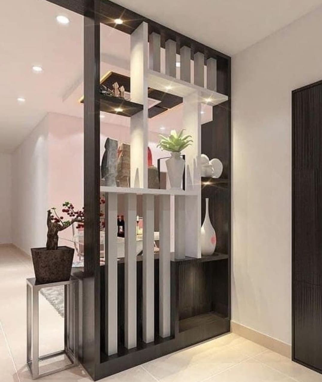 Decorative room divider with integrated lighting and display shelves.