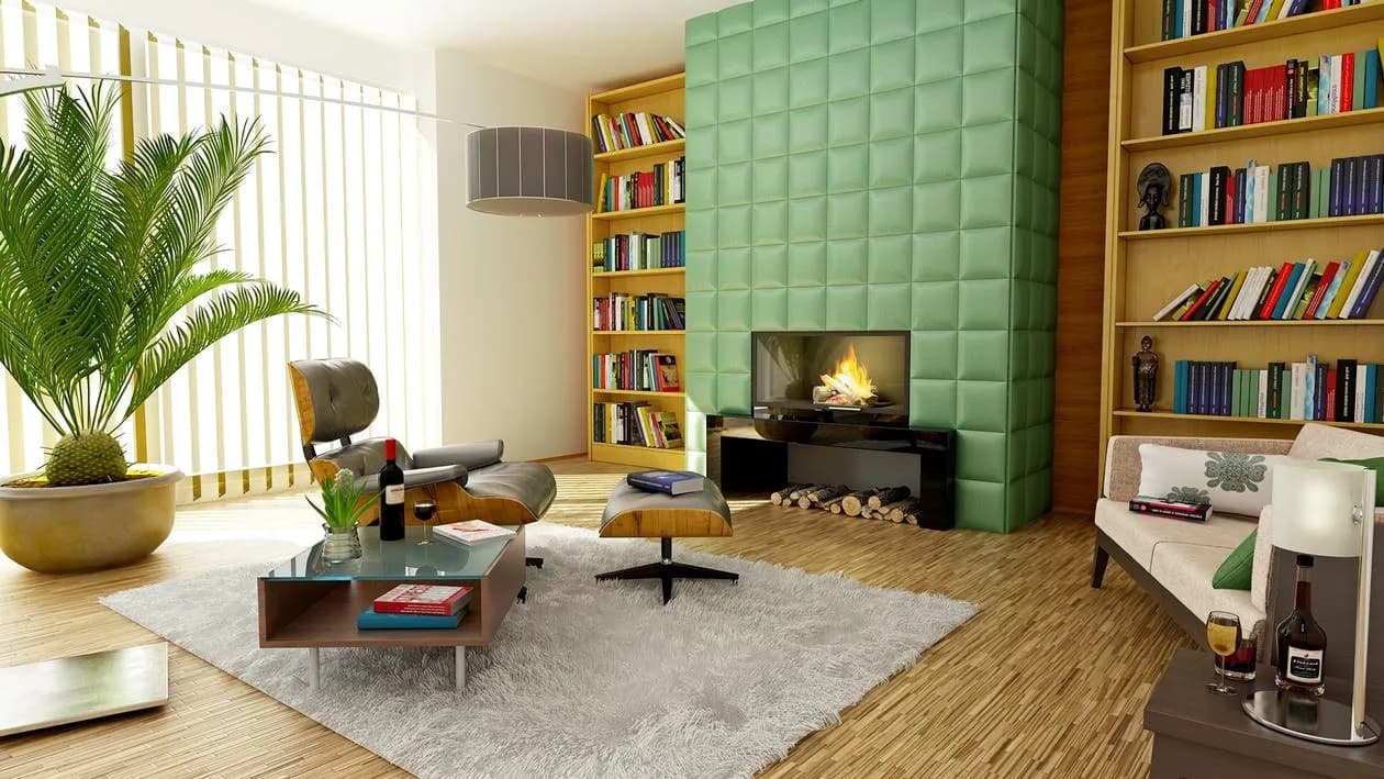 A modern living room with green accent wall paneling, fireplace, built-in bookshelves and contemporary seating.