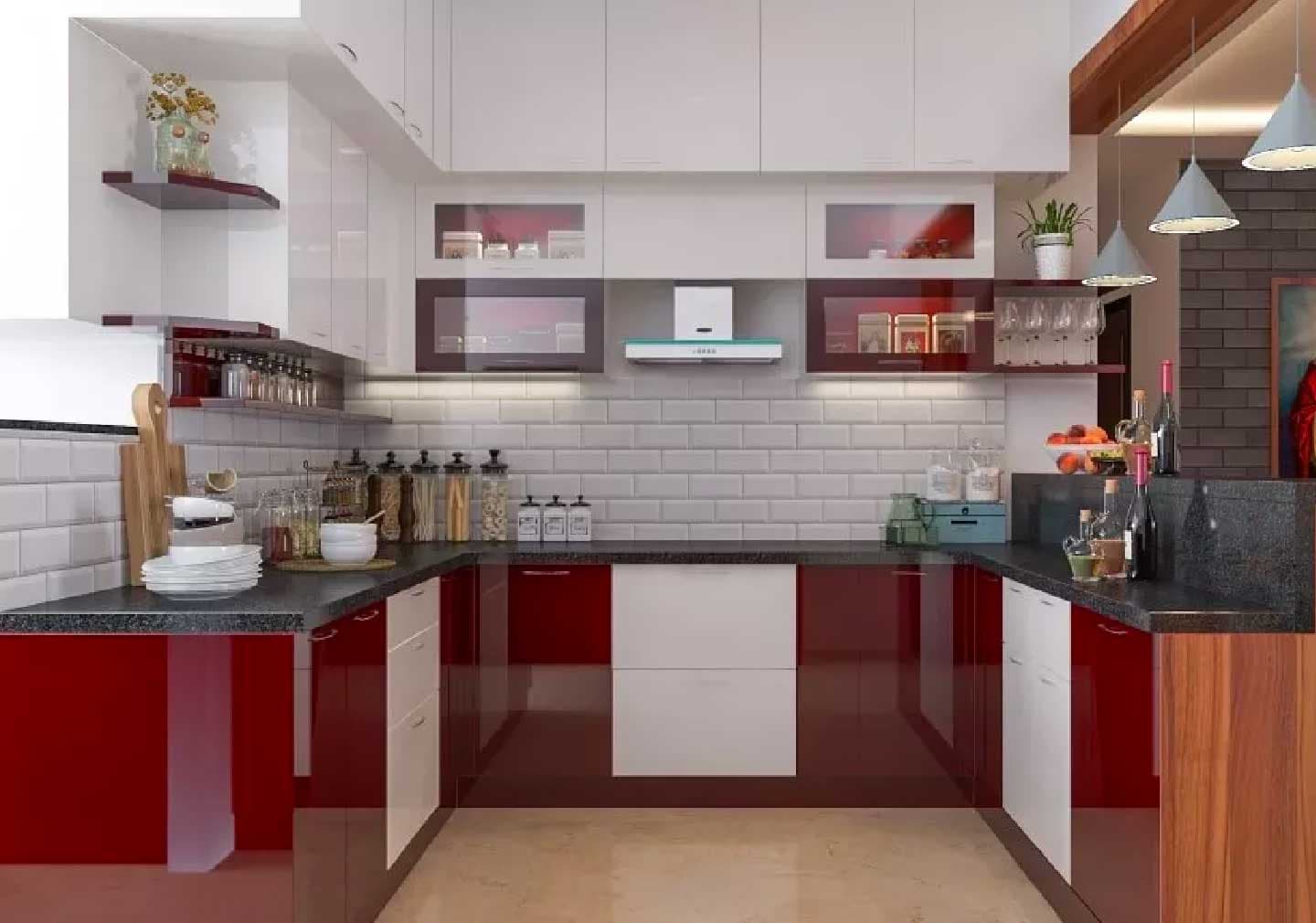 A contemporary red and white modular PVC kitchen with glass-front cabinetry and integrated appliances.