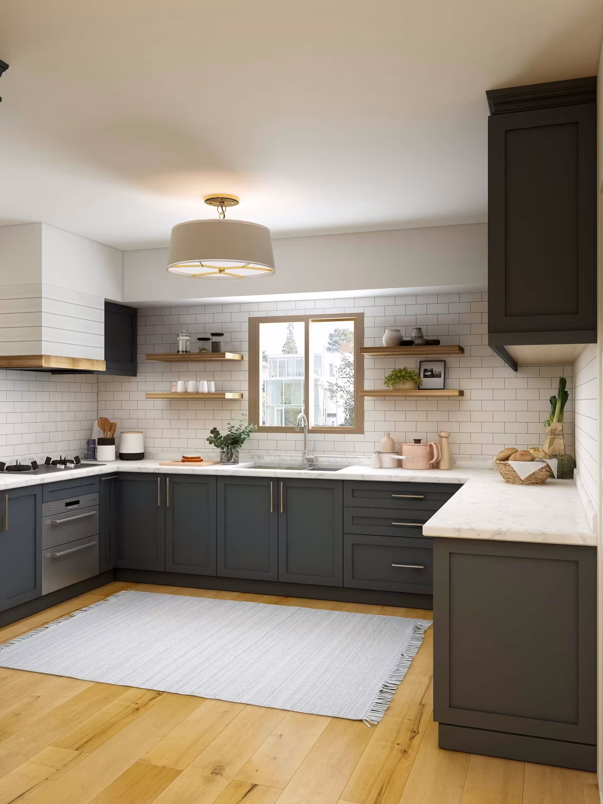 Full-height RAVYA kitchen storage and pantry units in a moisture-proof PVC finish.