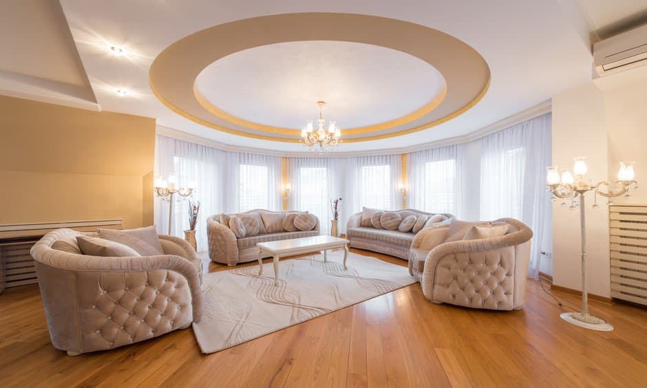 Contemporary RAVYA living room layout with a TV unit and storage.